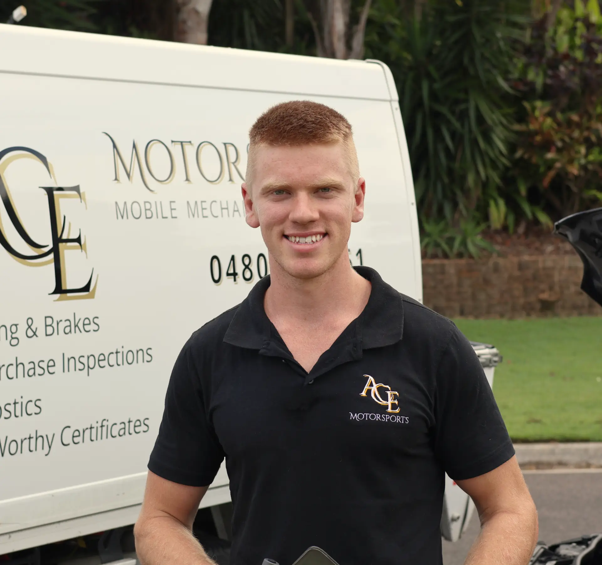 Jazz, owner and inspector at Ace Motorsports, in front of the mobile inspection van